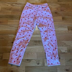 I BELIEVE IN A THING CALLED LOVE - Pink Heart Patterned Women's Jeans
